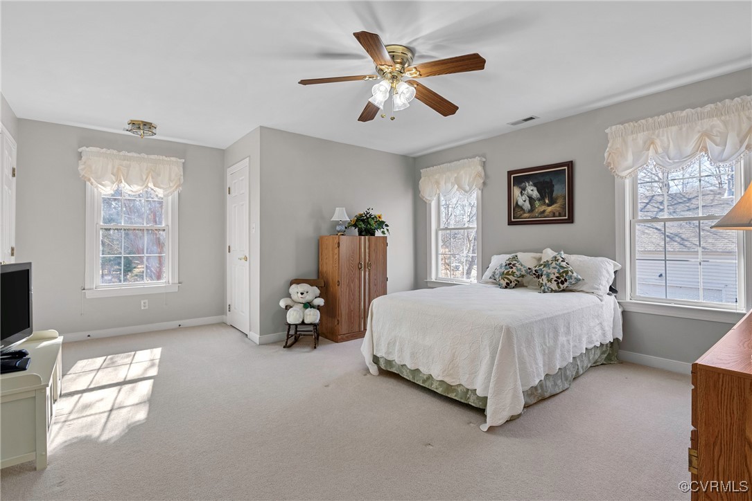 9134 Stephens Manor Drive Mechanicsville, VA 23116 - Photo 32 of 44 Carpeted bedroom with ceiling fan