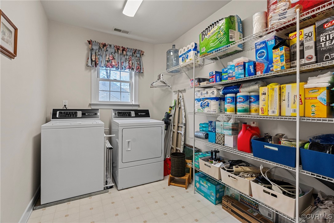 9134 Stephens Manor Drive Mechanicsville, VA 23116 - Photo 34 of 44 Laundry area with gas and electric hookup