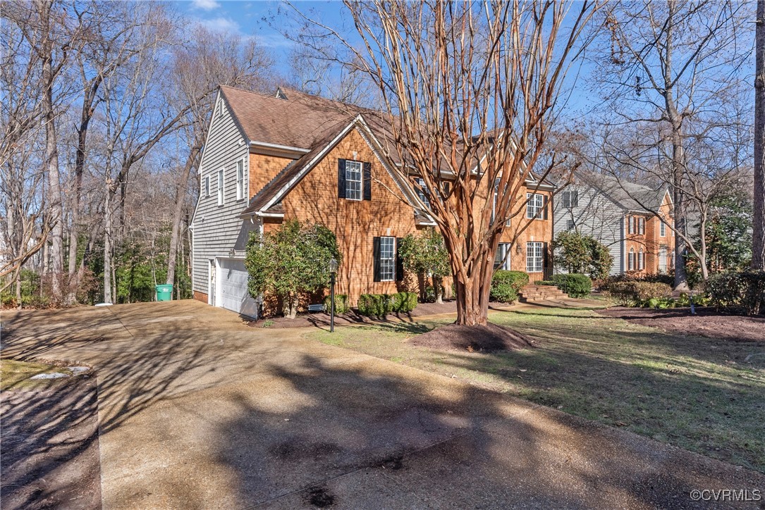 9134 Stephens Manor Drive Mechanicsville, VA 23116 - Photo 43 of 44 View of front of property featuring a garage