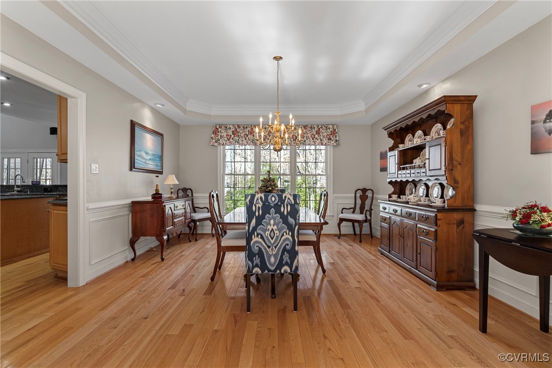 9134 Stephens Manor Drive Mechanicsville, VA 23116 - Photo 6 of 44 Dining area featuring tray ceiling, triple window,