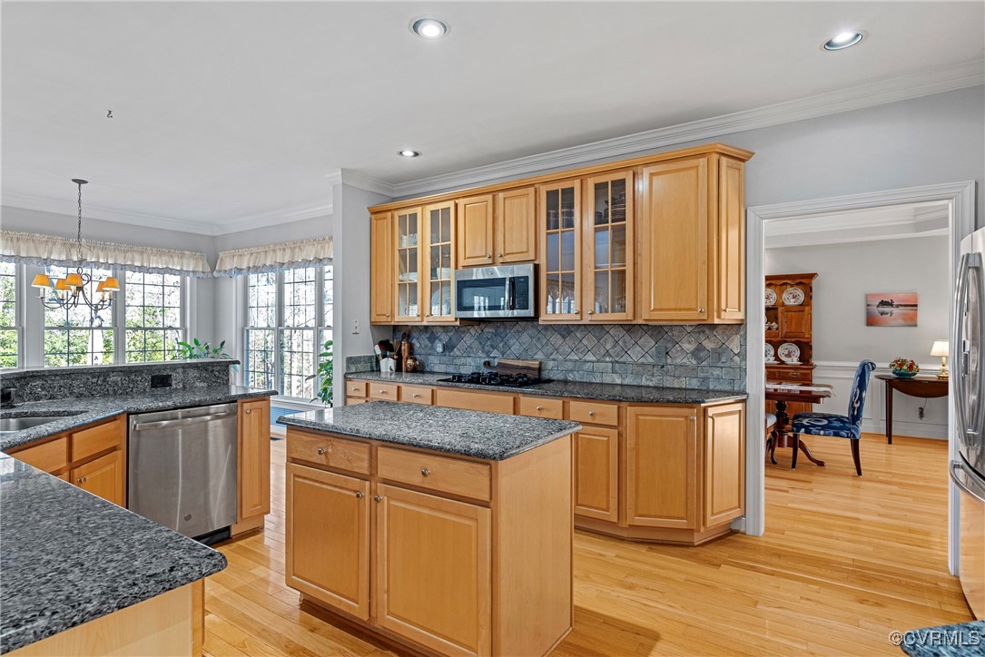9134 Stephens Manor Drive Mechanicsville, VA 23116 - Photo 10 of 44 Kitchen featuring a center island, hanging light f