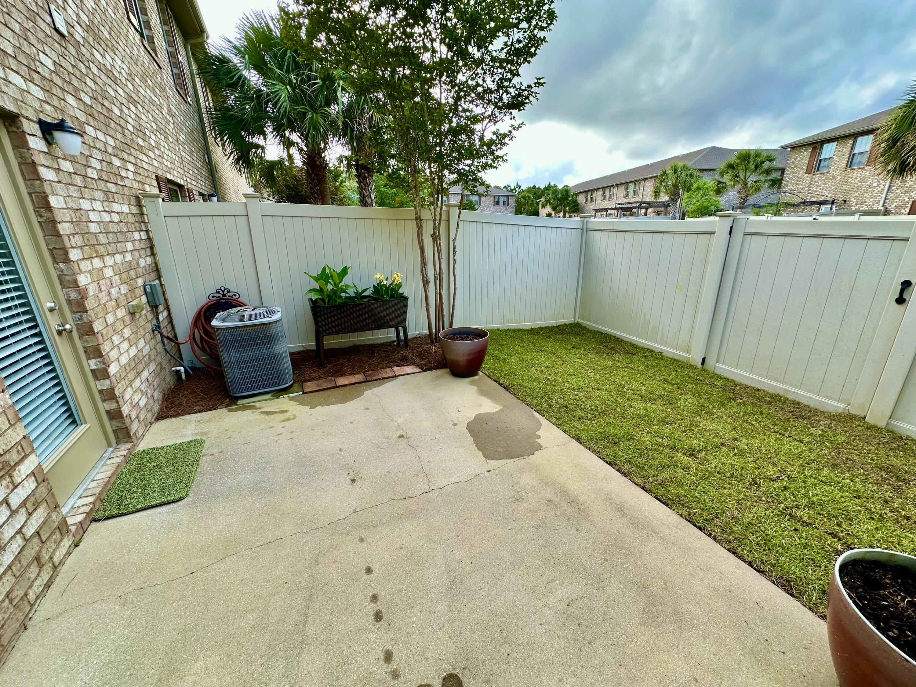 8872 White Ibis Way Navarre, FL 32566 - Photo 1 of 1 a view of a backyard