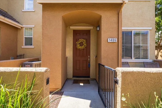 a view of a balcony with furniture and wooden floor