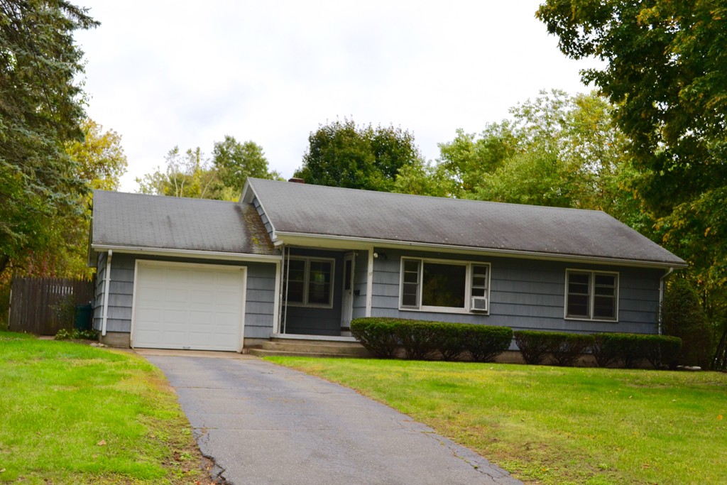 77 North Street Three Rivers, MA 01080 - Photo 1 of 20 a front view of a house with a garden
