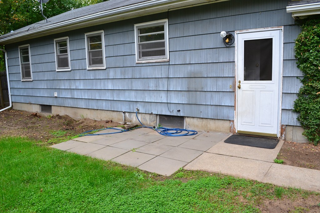 77 North Street Three Rivers, MA 01080 - Photo 20 of 20 a view of a backyard with plants and large tree