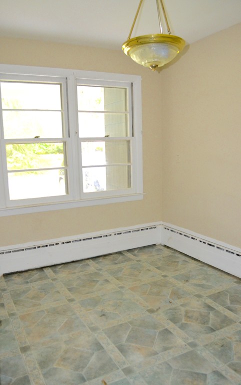 77 North Street Three Rivers, MA 01080 - Photo 3 of 20 an empty room with a window
