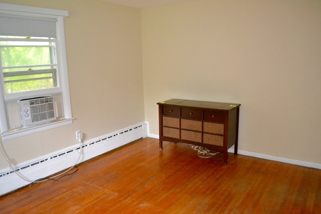 77 North Street Three Rivers, MA 01080 - Photo 7 of 20 a view of a room with wooden floor and a window