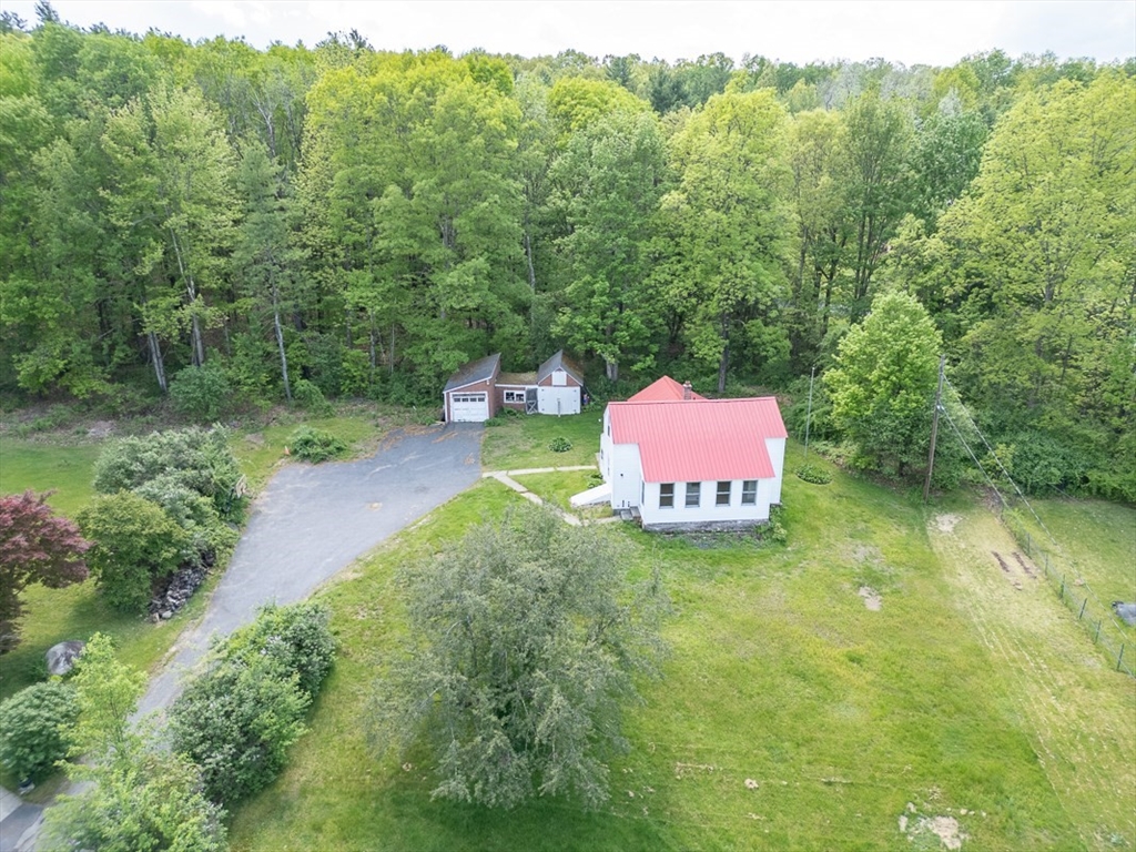 92 Squannacook Road Shirley, MA 01464 - Photo 32 of 38 a garden view with a seating space
