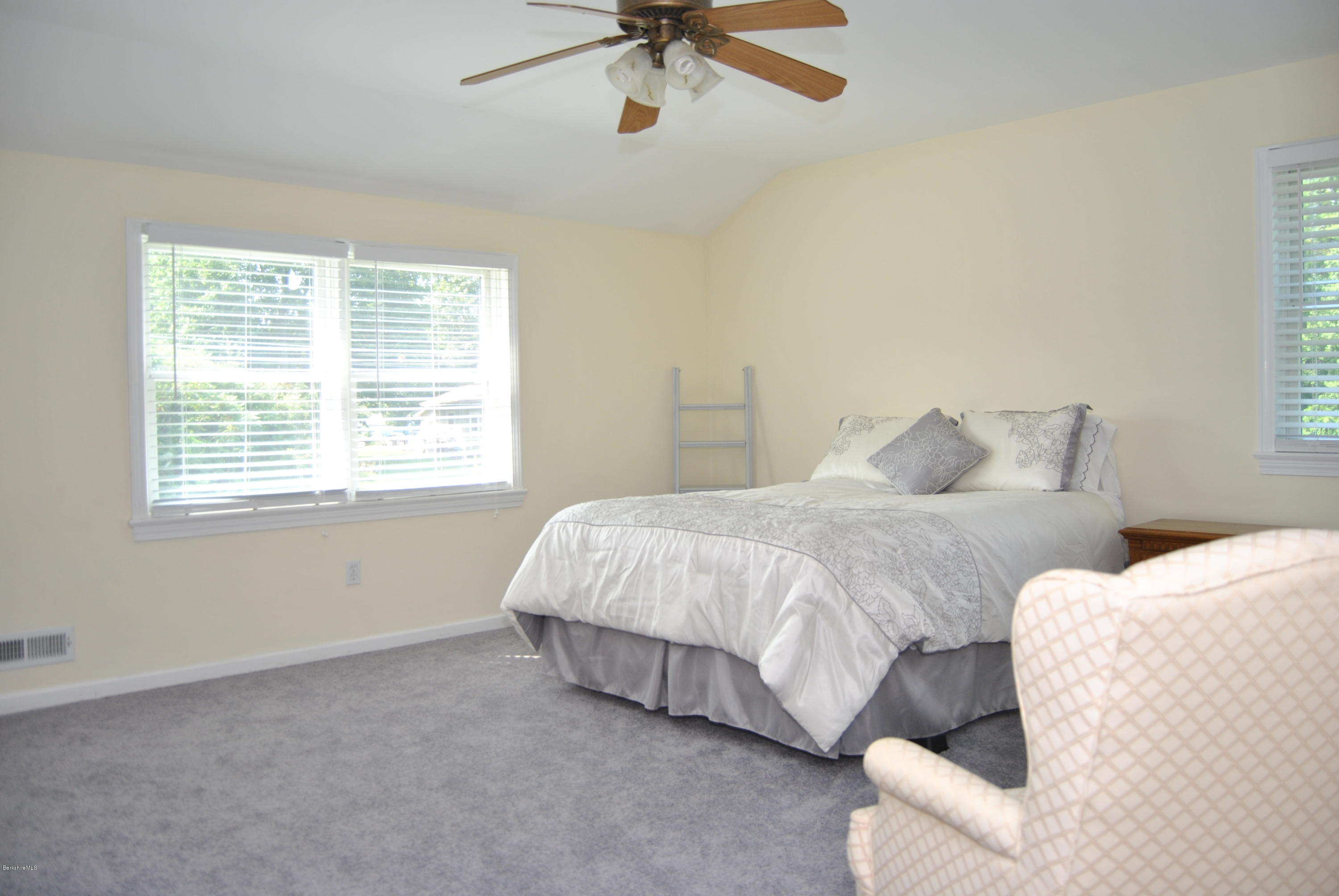 232 Salisbury Road Sheffield, MA 01257 - Photo 12 of 18 a spacious bedroom with a bed and window