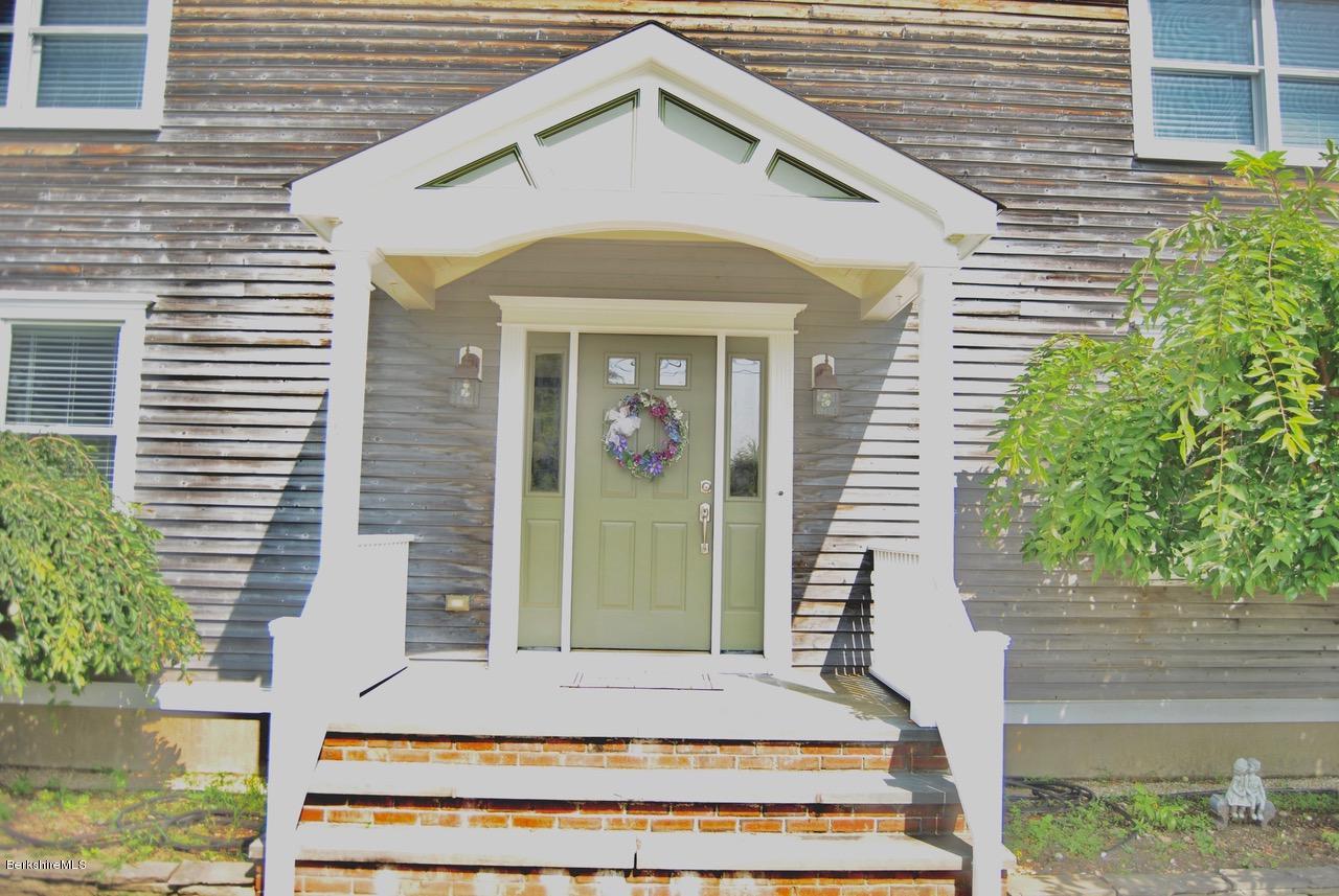 232 Salisbury Road Sheffield, MA 01257 - Photo 17 of 18 a front view of a house with a yard