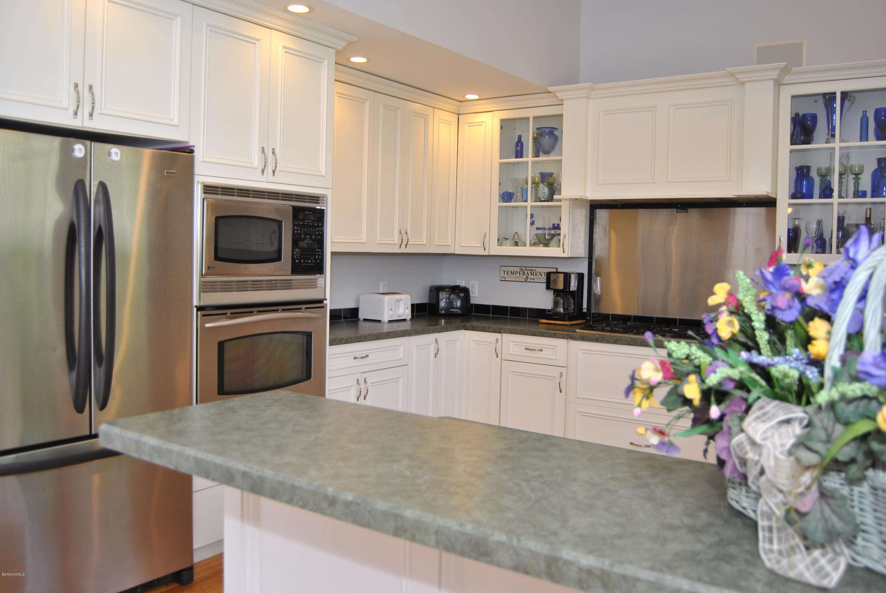 232 Salisbury Road Sheffield, MA 01257 - Photo 7 of 18 a kitchen with stainless steel appliances granite countertop a refrigerator sink and microwave