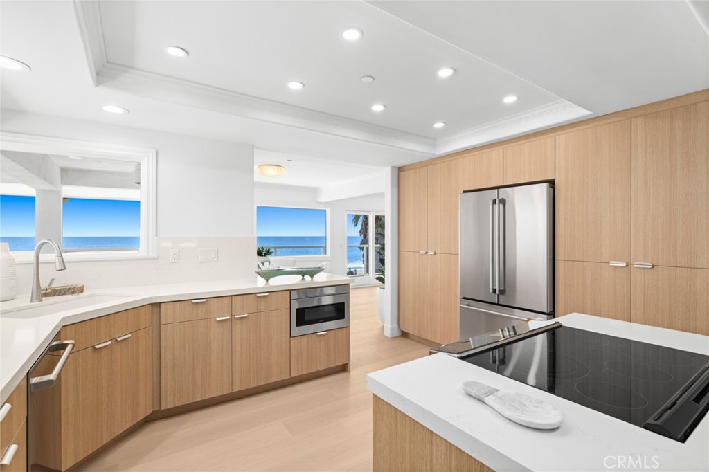 326 Boca Del Canon San Clemente, CA 92672 - Photo 16 of 69 a kitchen that has a sink and a stove in it
