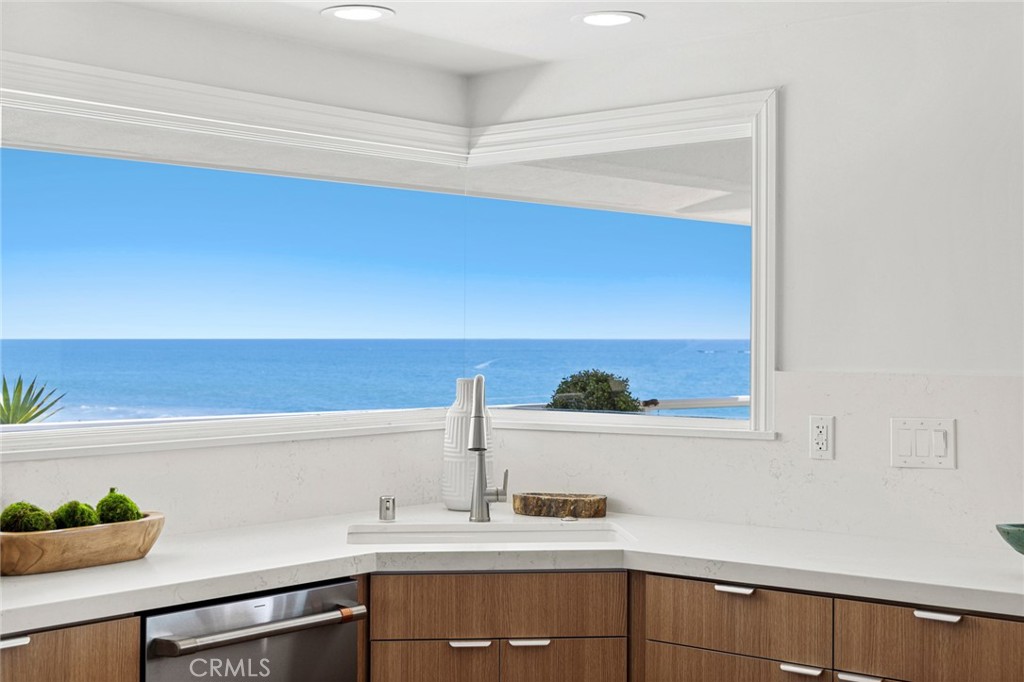 326 Boca Del Canon San Clemente, CA 92672 - Photo 24 of 69 a kitchen with a sink and cabinets