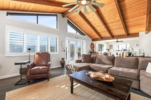 a view of a livingroom with wooden floor