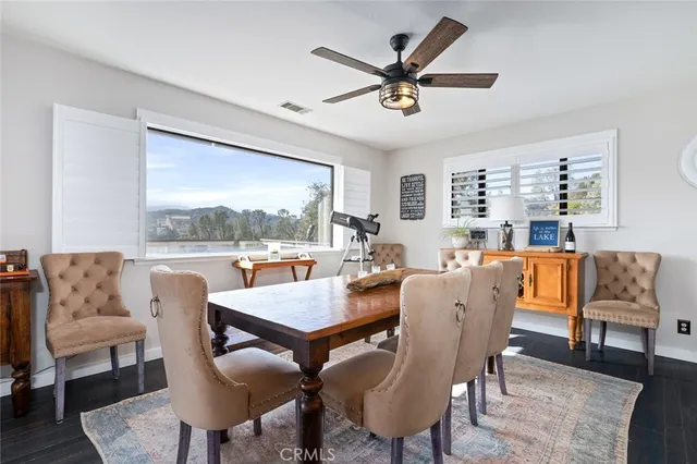 a view of balcony with wooden floor and city view