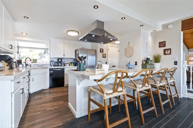 a view of a balcony with chairs