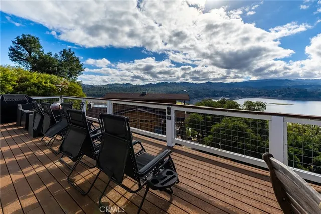a bed room with a bed and a chandelier