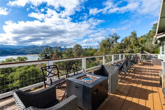 a view of roof deck with furniture