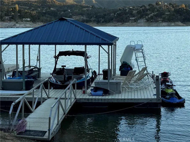 a view of outdoor space with deck and furniture