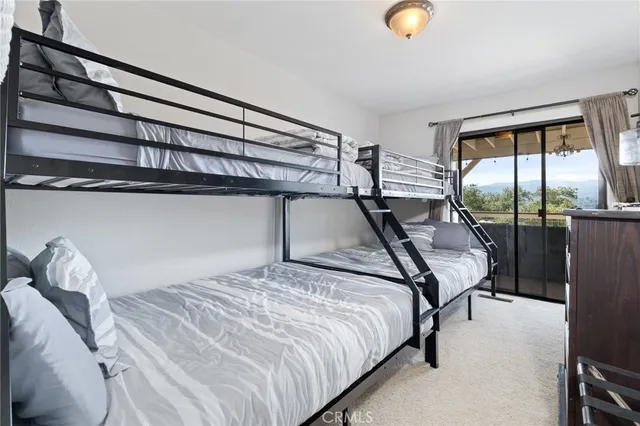a aerial view of a house with pool yard outdoor seating and yard