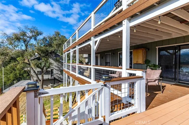 an aerial view of a house with a lake view