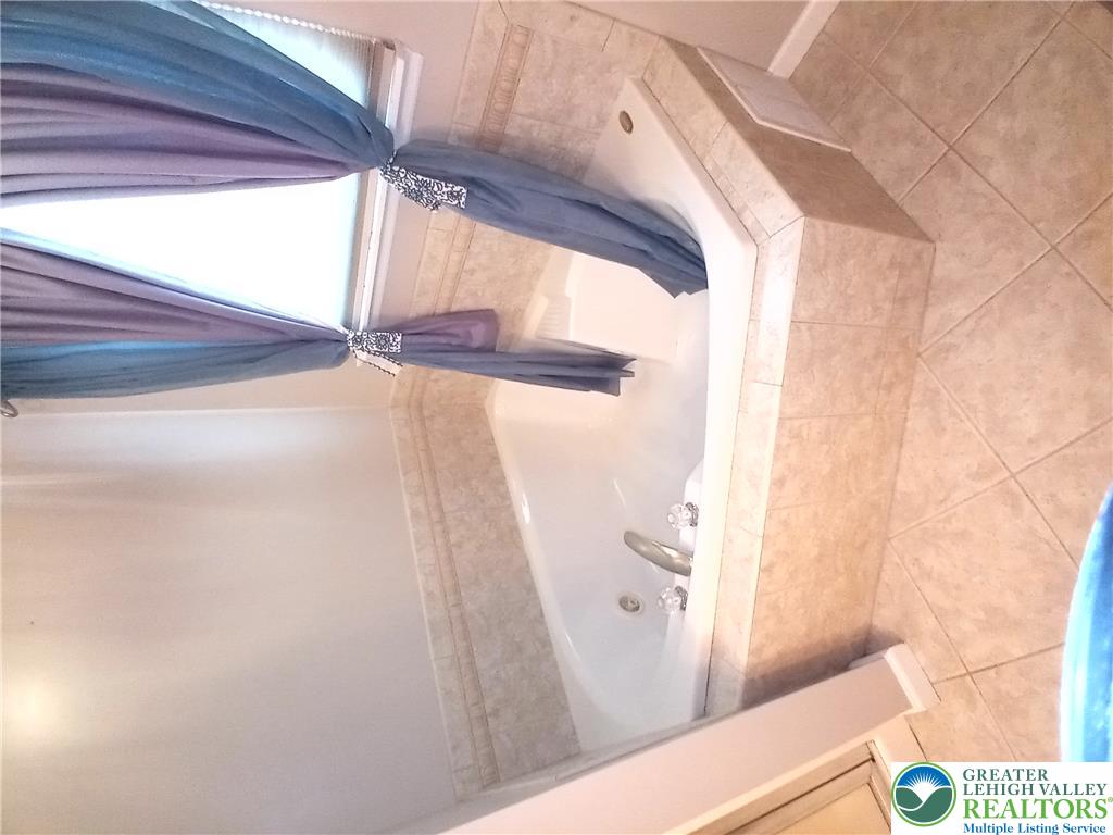 1560 Deer Path Road Easton, PA 18040 - Photo 18 of 38 Beautiful Large soaking tub in primary bathroom