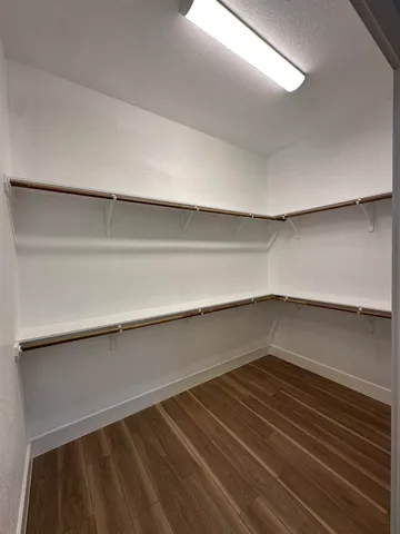 a storage room with washer and dryer