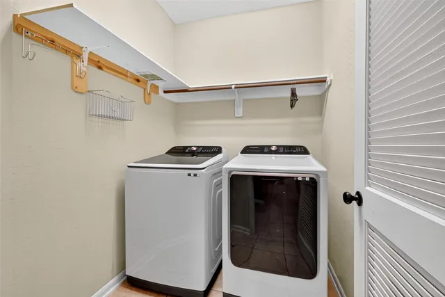 a utility room with dryer and washer