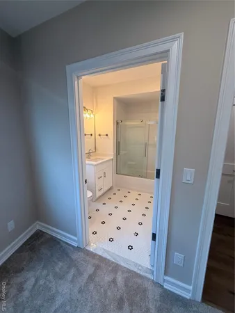 a view of living room with furniture and a window