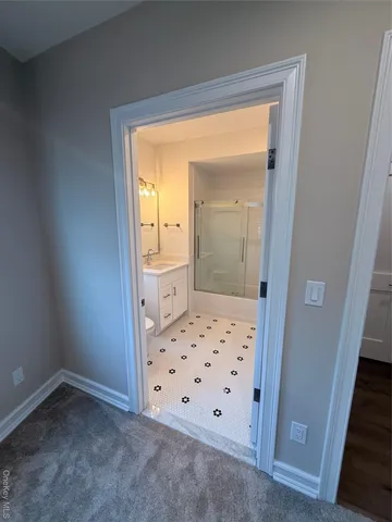 a view of living room with furniture and a window