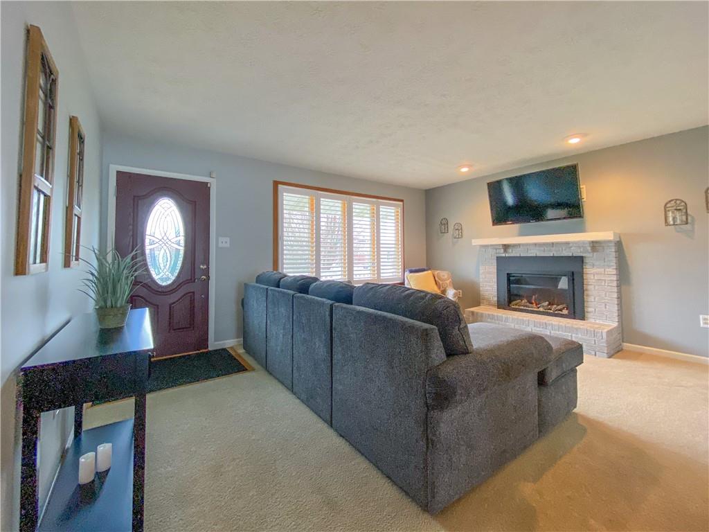 726 Spruce Street Rochester, PA 15074 - Photo 4 of 23 Neutral tones and flooded with natural light during the day. Warm and cozy during the crisp evenings of fall and winter
