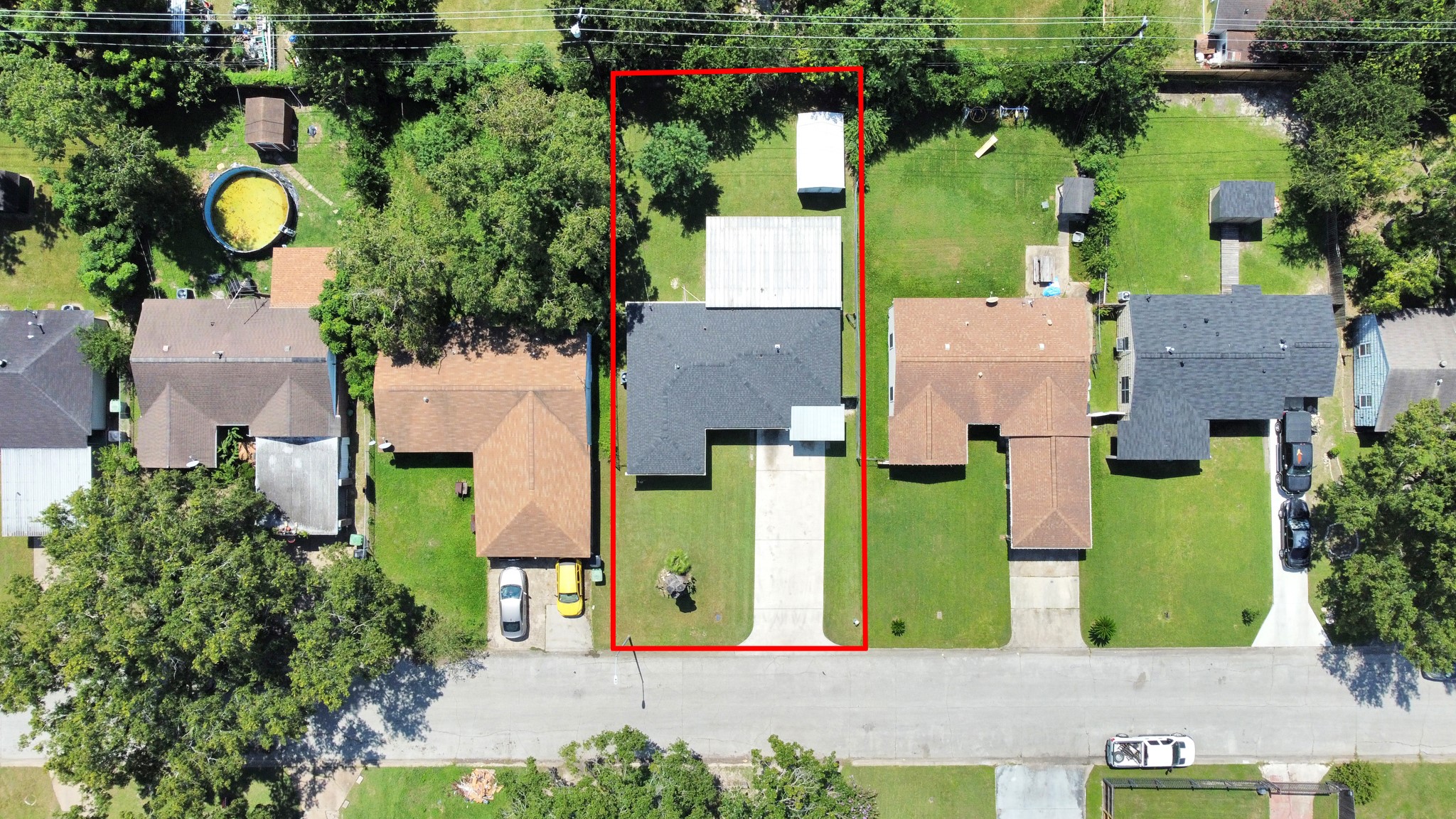 5202 Pensdale Street Houston, TX 77033 - Photo 32 of 32 an aerial view of a house with a swimming pool
