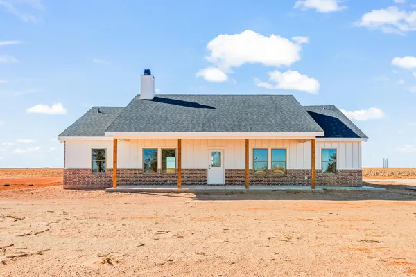 a front view of house with yard