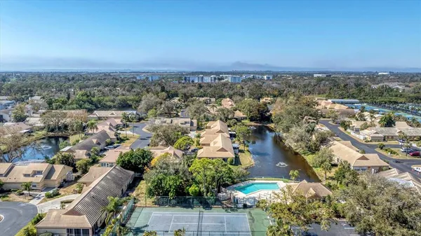 an aerial view of a city with lots of residential buildings