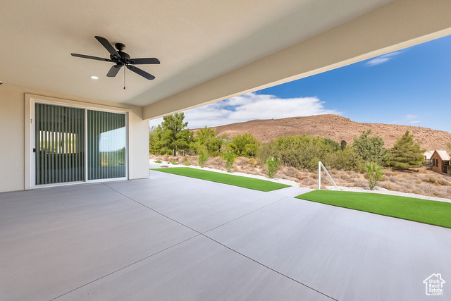 230 Boulder Way Leeds, UT 84746 - Photo 47 of 72 View of rear covered patio / terrace featuring a ceiling fan and a mountain views