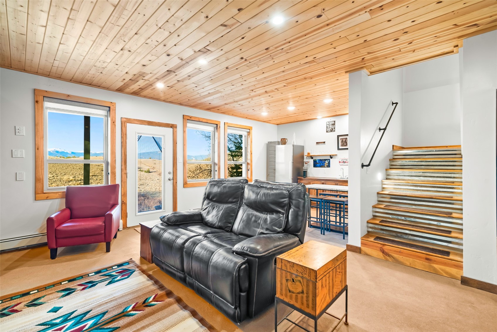 440 Arland Road Como, CO 80432 - Photo 30 of 49 a living room with furniture and a flat screen tv