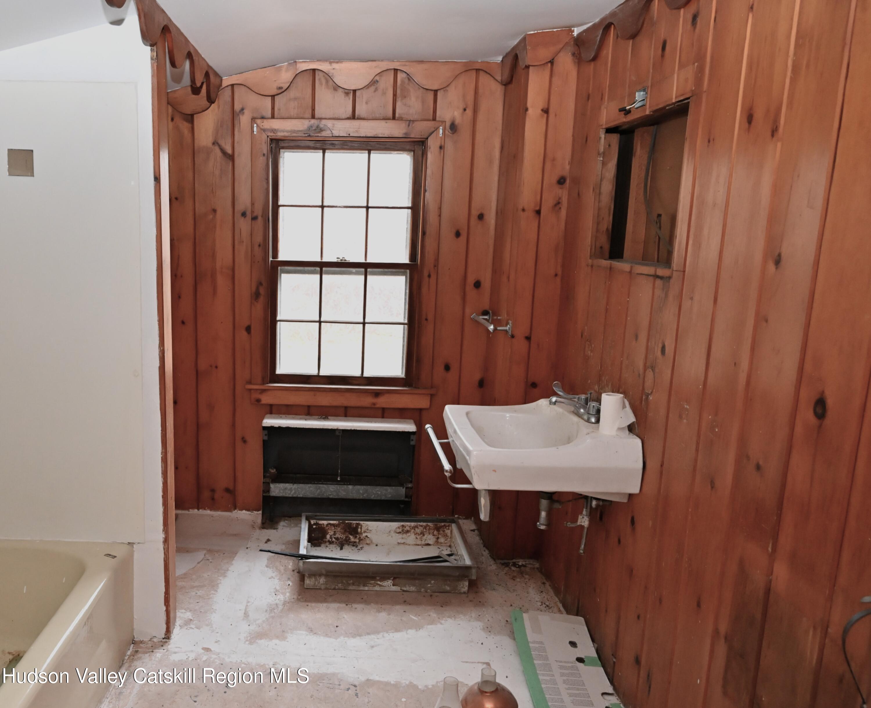 163 County Rte 14 Hudson, NY 12534 - Photo 21 of 49 a room with a table chairs and a window