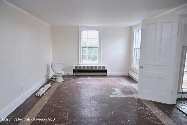 an empty room with windows