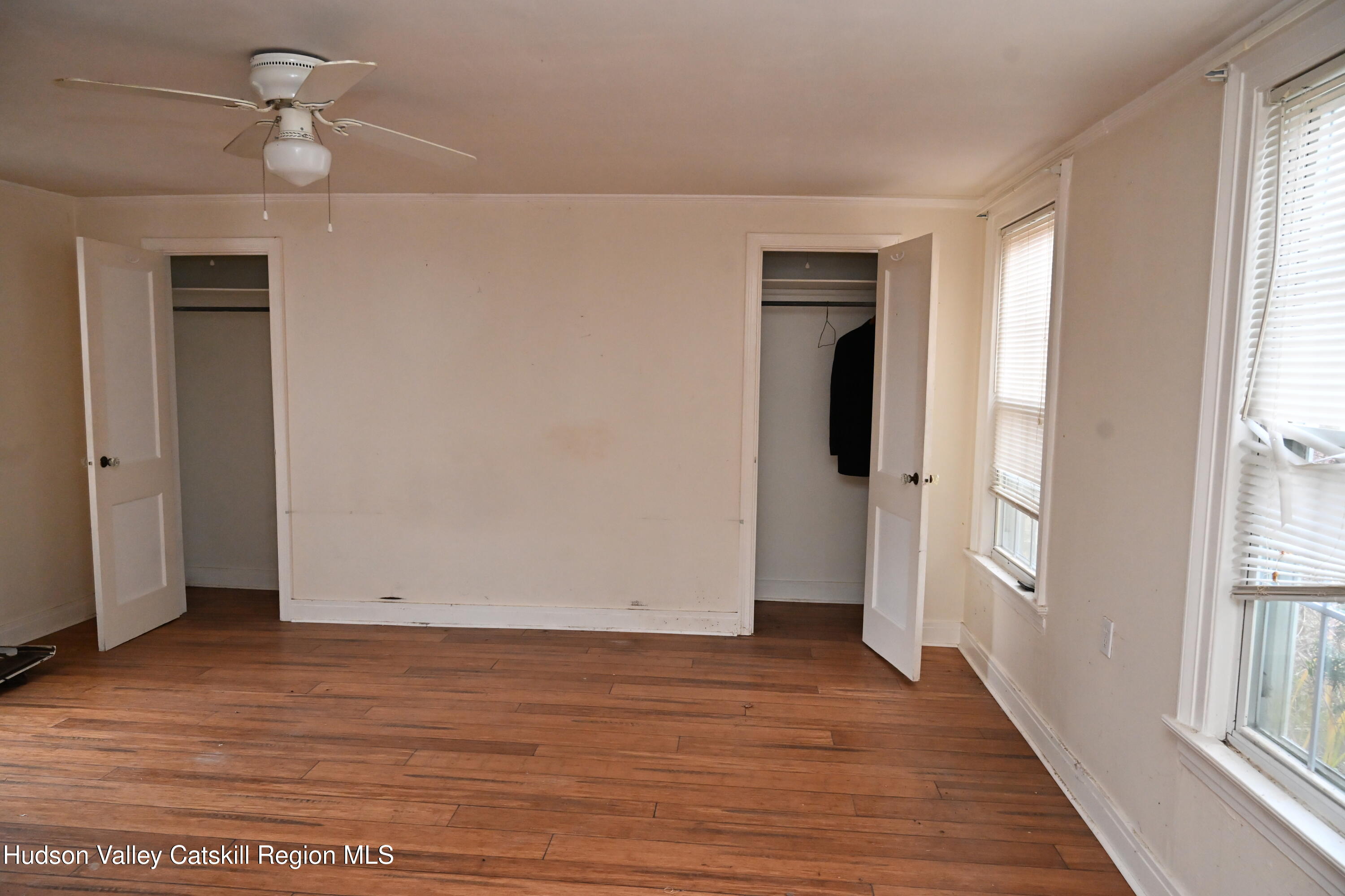163 County Rte 14 Hudson, NY 12534 - Photo 40 of 49 a view of an empty room with wooden floor and a window