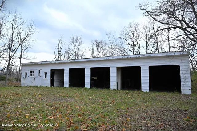 a view of garage with wooden floor