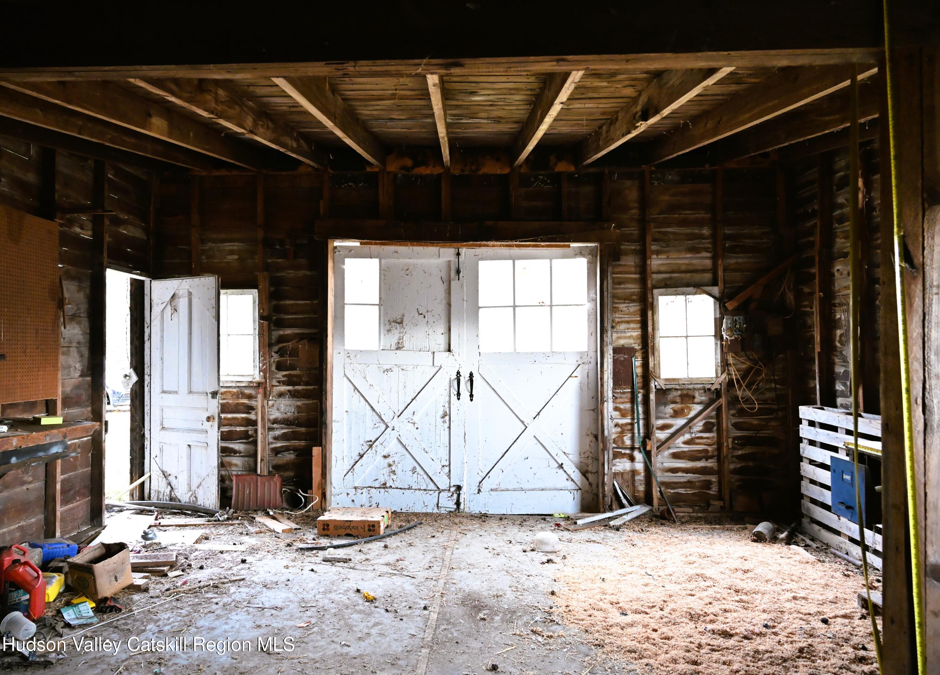 163 County Rte 14 Hudson, NY 12534 - Photo 46 of 49 a view of garage with wooden floor