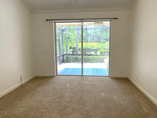 a view of a room with a large window