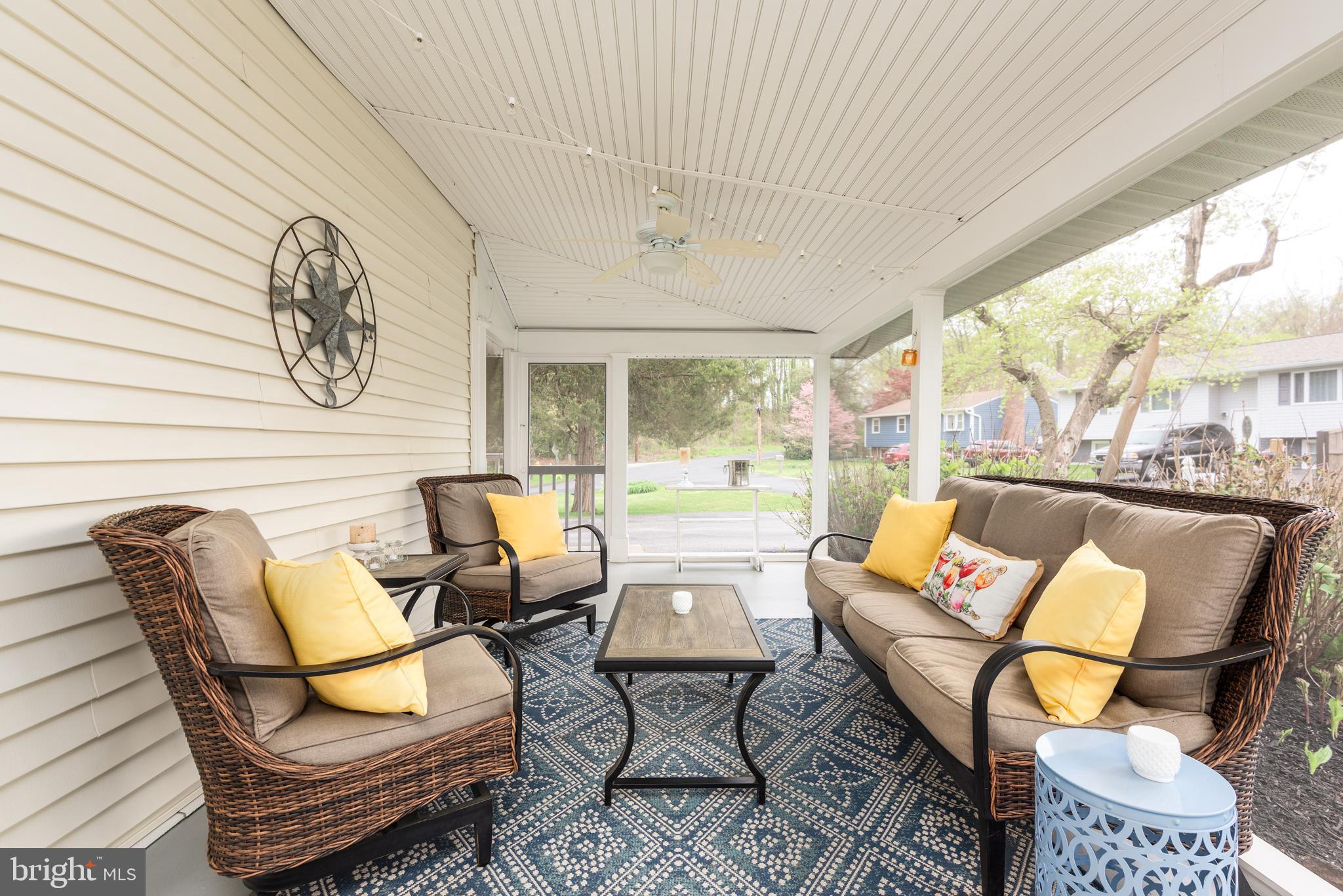 134 Cresston Road Arnold, MD 21012 - Photo 28 of 35 a living room with furniture a rug and a large window
