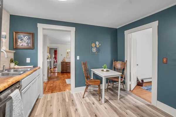 a workspace with furniture and wooden floor
