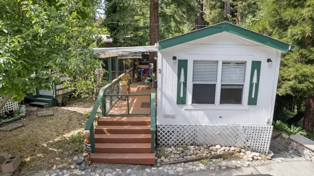 a front view of a house with stairs