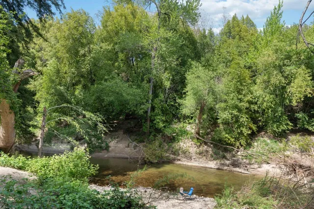 a view of outdoor space and a lake view