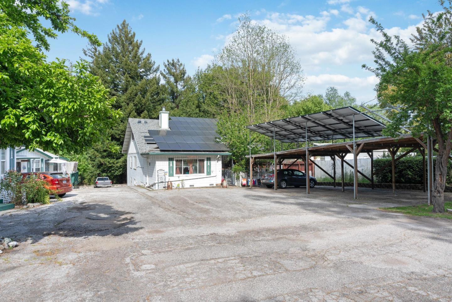 6444 Highway 9 Felton, CA 95018 - Photo 7 of 15 a view of a house with large trees and wooden fence