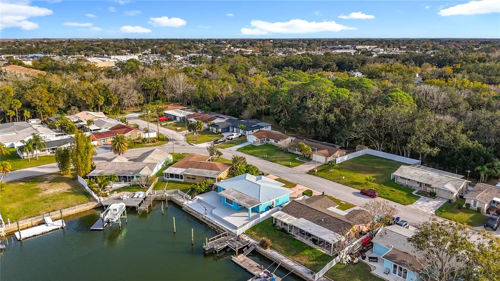 4869 Shell Stream Boulevard New Port Richey, FL 34652 - Photo 6 of 46 an aerial view of residential houses with outdoor space