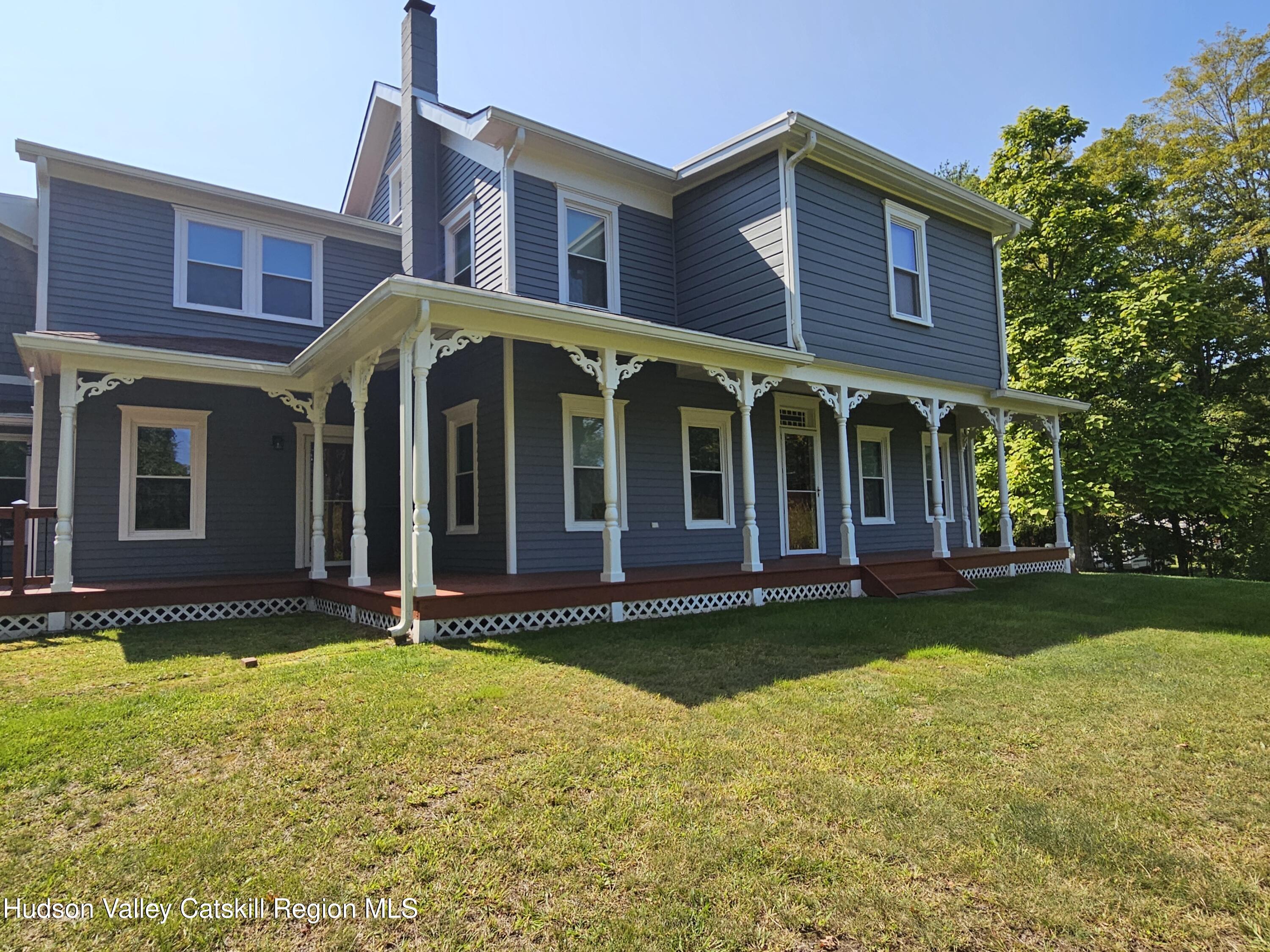 463 Cairo Junction Road Catskill, NY 12414 - Photo 3 of 35 a view of a brick house with a yard