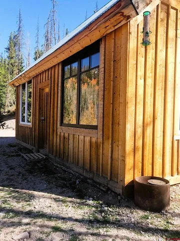 a view of a backyard of the house